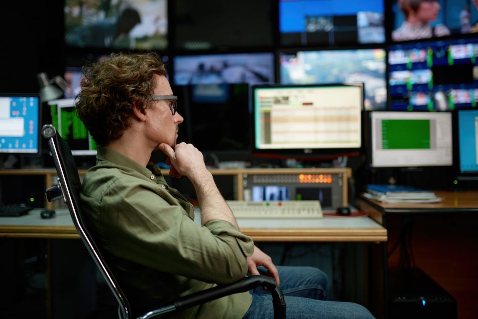 system administrator sitting in chair looking at c 2023 11 27 05 21 00 utc